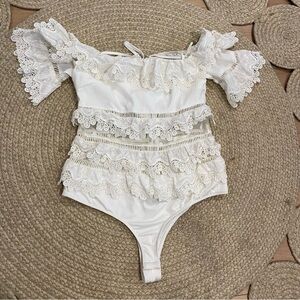 Alpha & omega white OFF-SHOULDER RUFFLE BODYSUIT M